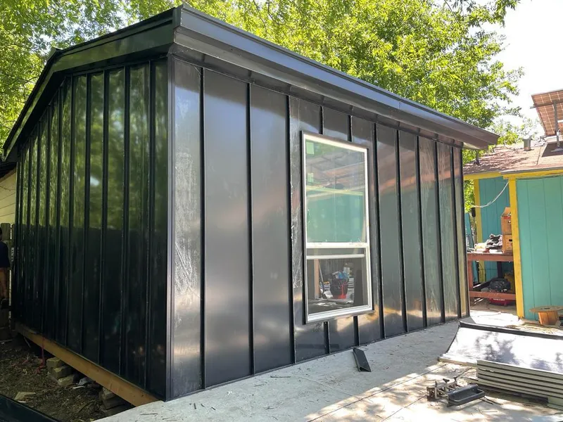 Black standing seam metal wall panels for Roof Inspection in Kenai