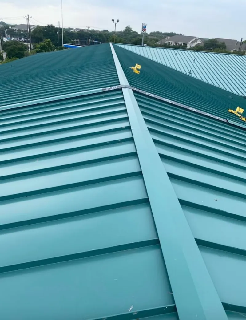 Green commercial metal roof ridge and valley for Metal Roof Repair in Kenai