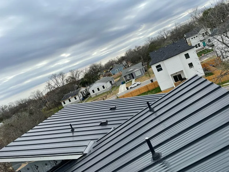 Standing seam metal roof panels with vents for Skylight Repair in Kenai